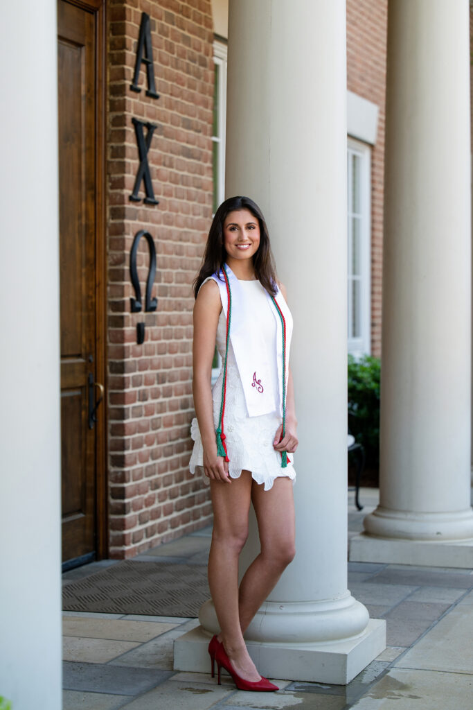 Bama grad poses at Alpha Chi Omega during her grad session with Chris Landau Photography